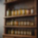 Glass bottles of various cooking oils arranged on a wooden shelf