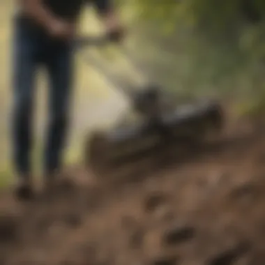 Using a Leveling Rake on Uneven Terrain An operator using a leveling rake on uneven terrain