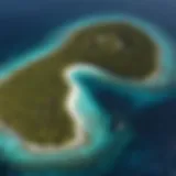 Aerial view of Meemu Atoll showcasing vibrant coral reefs