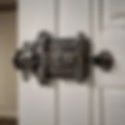 Detailed view of a spring loaded door latch with chain