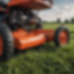 Close-up view of a Kubota disc mower cutting through tall grass