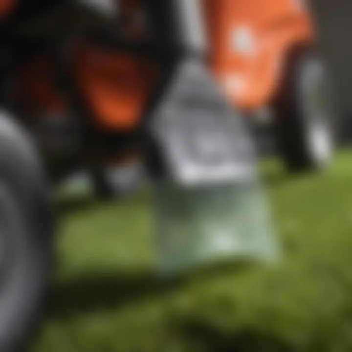 Close-up view of a lawn tractor vacuum's nozzle and bag.