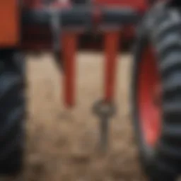 Detailed view of a sleeve hitch implement attached to a tractor