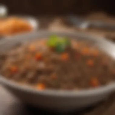 A close-up of cooked lentils in a bowl, highlighting their rich textures and appealing appearance.