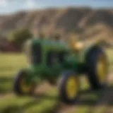 A vintage John Deere tractor in a lush Choteau field
