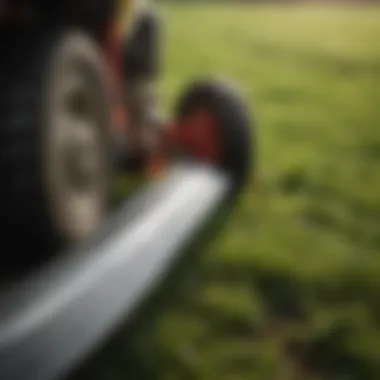 A close-up of a mower box blade showcasing its sharp edges and sturdy construction.