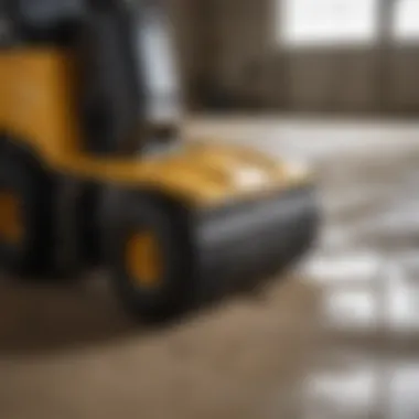 Ride-on floor scraper in action at a construction site